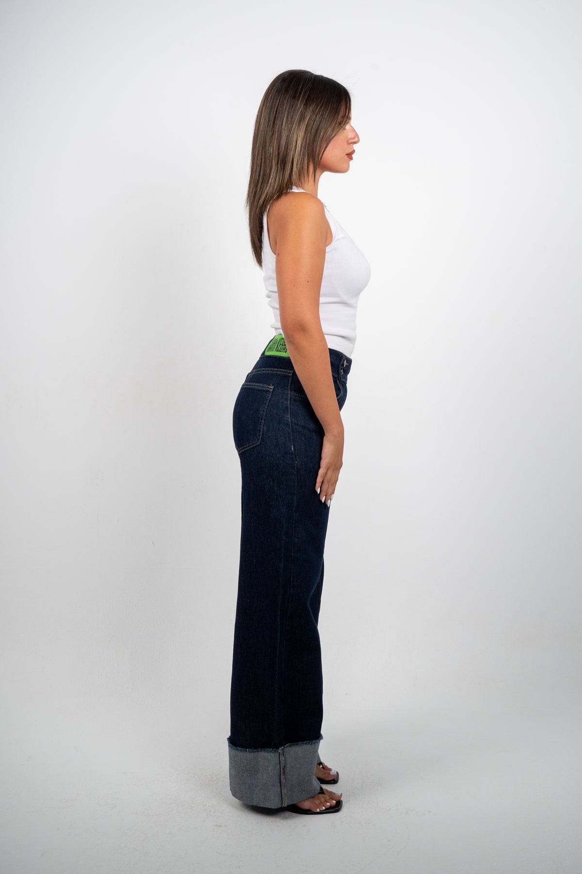 Double Button Cuffed Jeans — Dark, side view