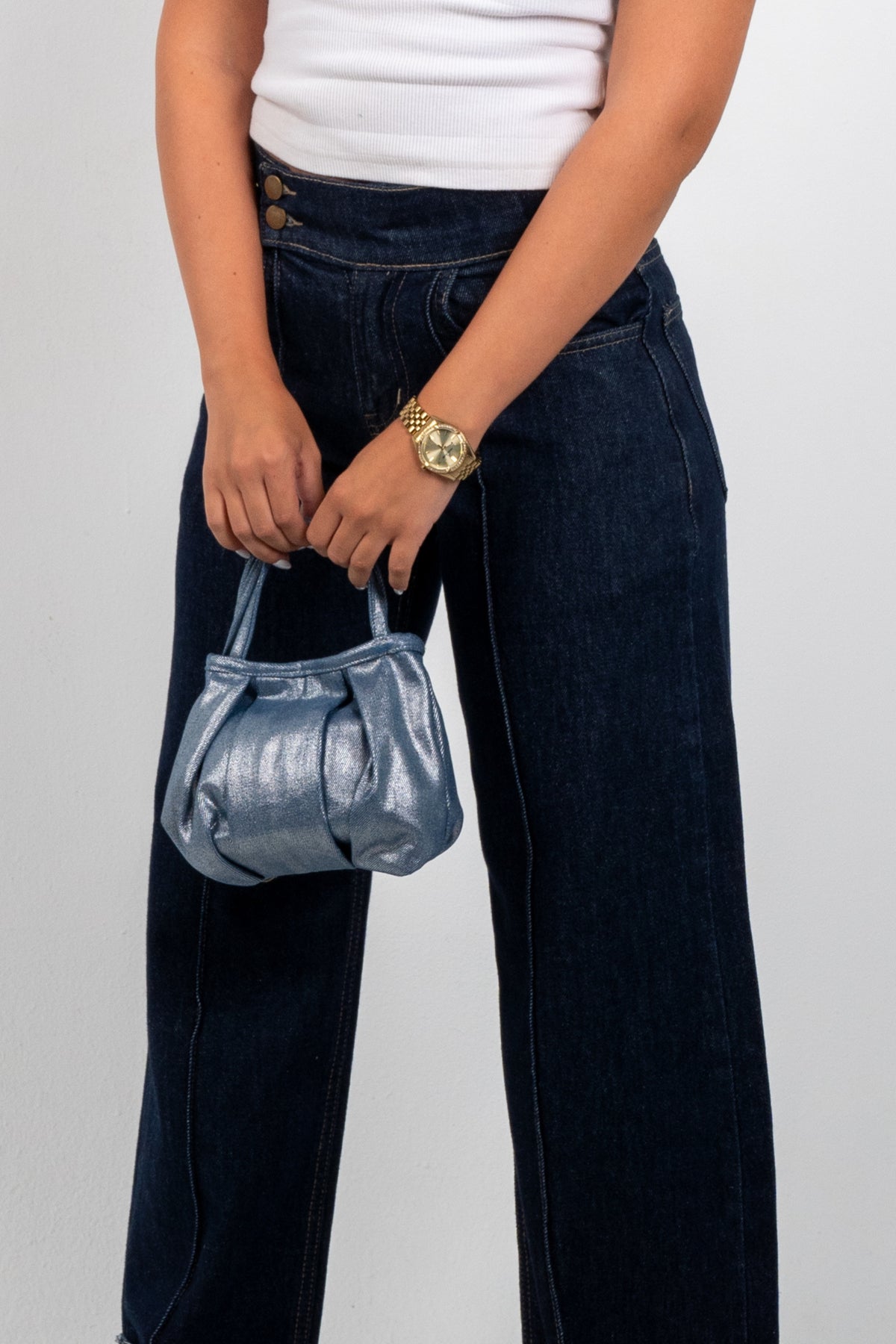 Puffy Mini Handbag, carried by the handles