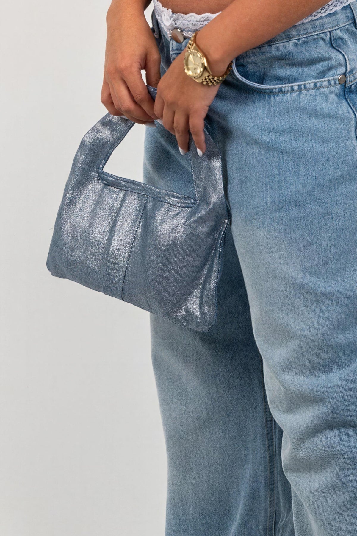 Sweet Spot Mini Handbag, carried by the handle